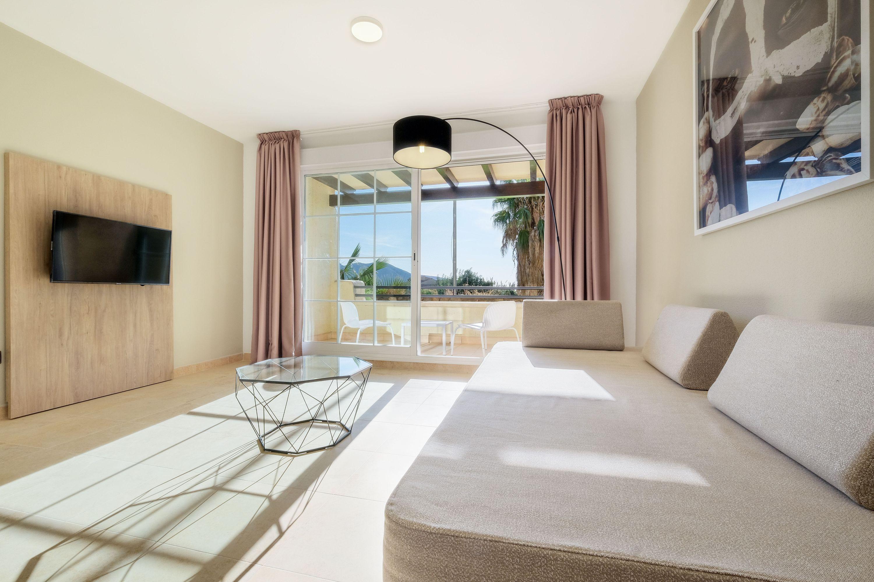 Hotel Envia Almeria Spa & Golf Агуадулсе Екстериор снимка A living room in a hotel