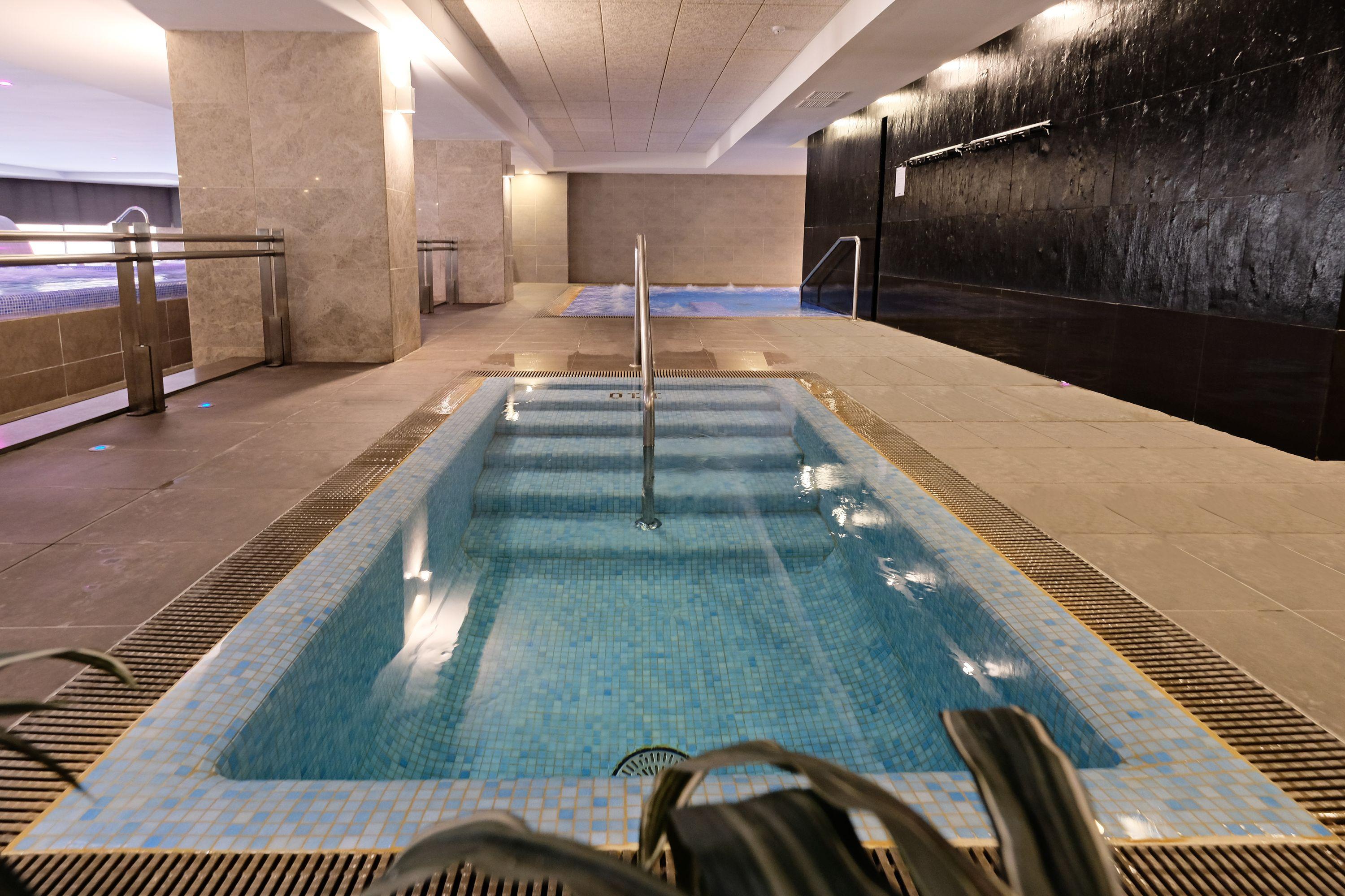 Hotel Envia Almeria Spa & Golf Агуадулсе Екстериор снимка The swimming pool at the hotel